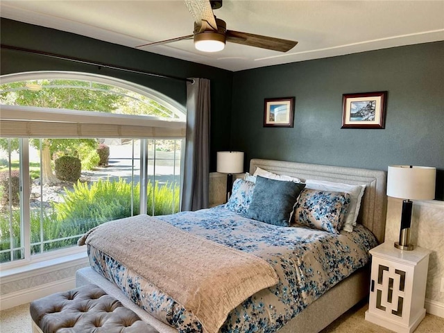 bedroom featuring carpet and ceiling fan