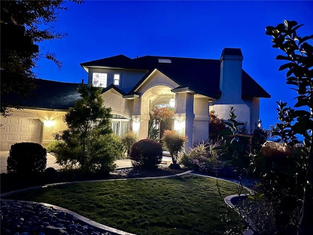15223 Ledgewood Dr, Redding, CA 96001 - view of front facade with stucco siding and a chimney