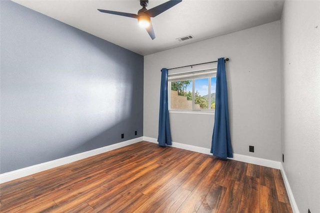 15223 Ledgewood Dr, Redding, CA 96001 - unfurnished room with wood finished floors, a ceiling fan, and baseboards