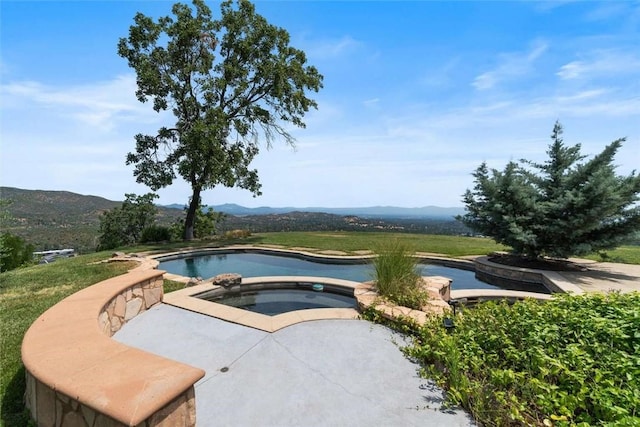 15223 Ledgewood Dr, Redding, CA 96001 - view of swimming pool with a mountain view and a pool with connected hot tub
