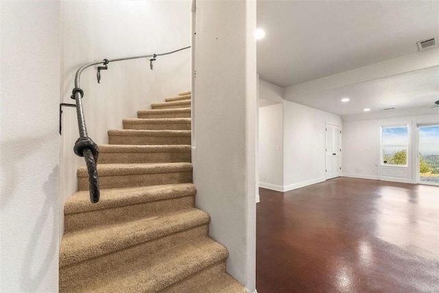 15223 Ledgewood Dr, Redding, CA 96001 - stairway featuring concrete flooring, baseboards, and recessed lighting