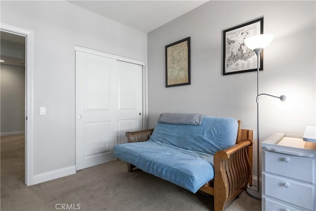 living area featuring light colored carpet