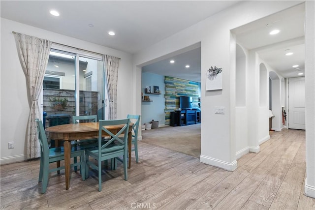 dining room with light wood-type flooring