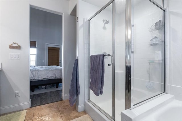 bathroom featuring tile patterned flooring and walk in shower