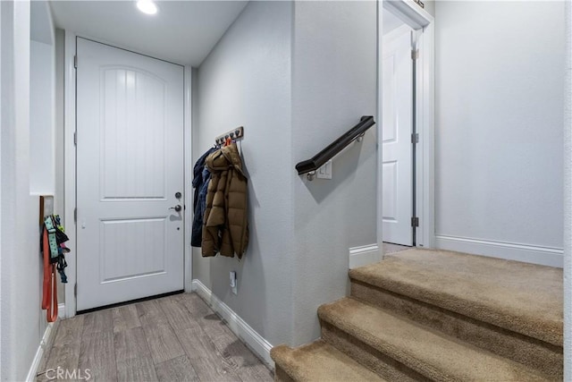 entrance foyer with light hardwood / wood-style flooring