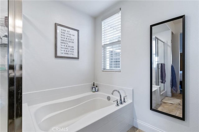 bathroom with independent shower and bath