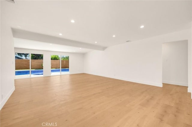 unfurnished room featuring light wood-type flooring