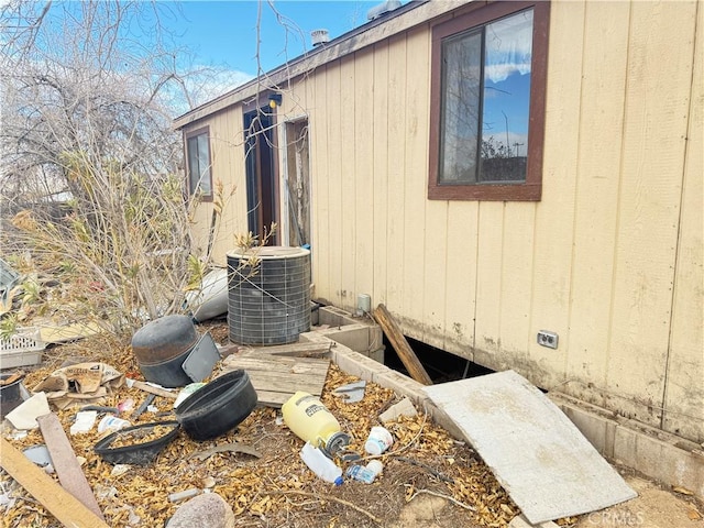 view of side of property featuring cooling unit