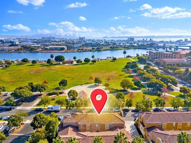 birds eye view of property featuring a water view