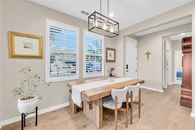 dining space featuring light hardwood / wood-style floors