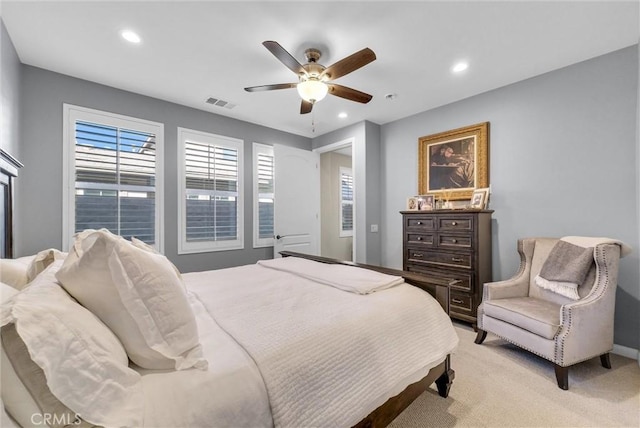 carpeted bedroom featuring ceiling fan