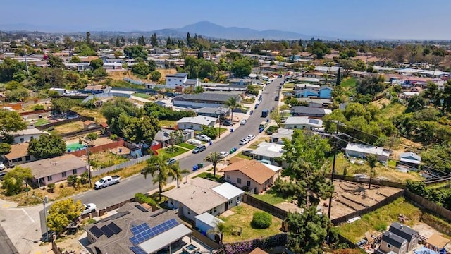 aerial view featuring a mountain view and a residential view