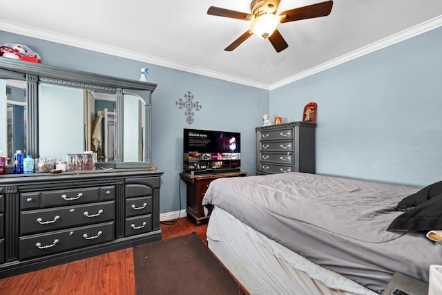 bedroom with ceiling fan, dark hardwood / wood-style flooring, and crown molding