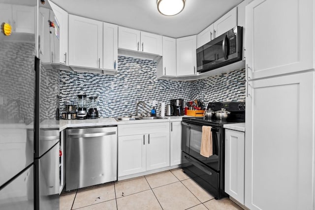 kitchen with white cabinetry, dishwasher, sink, and black range with electric cooktop