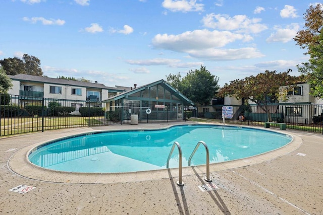 view of pool featuring a patio