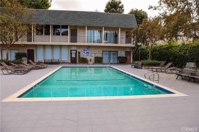 view of pool with a patio area