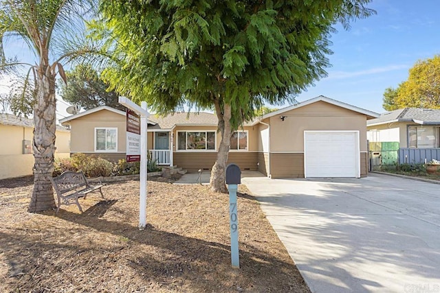 single story home featuring a garage