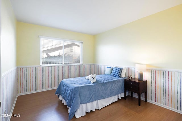 bedroom featuring hardwood / wood-style floors