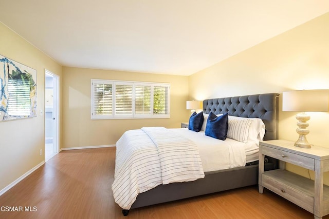 bedroom featuring hardwood / wood-style flooring