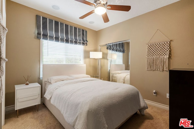 bedroom featuring ceiling fan and carpet floors