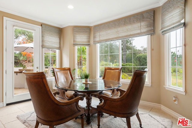 sunroom featuring a healthy amount of sunlight