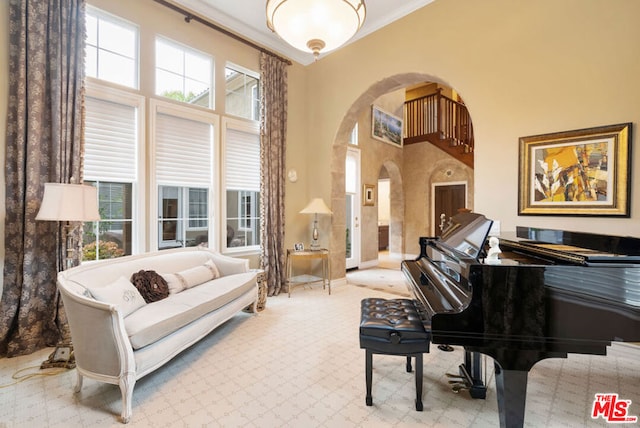 sitting room featuring ornamental molding