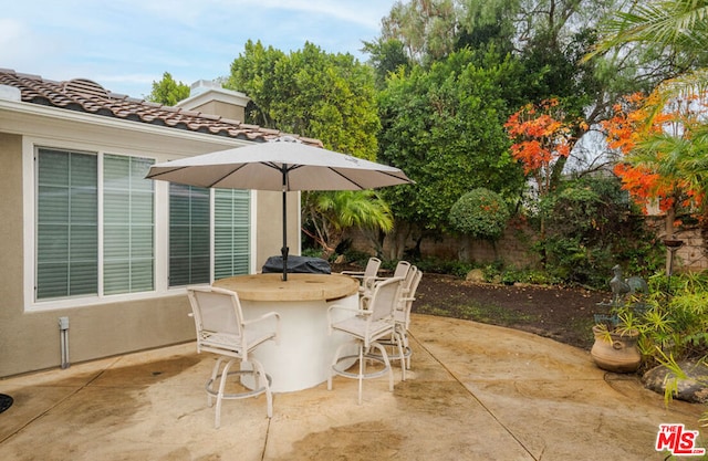 view of patio with a bar