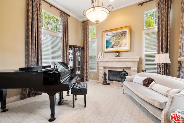 living area with crown molding