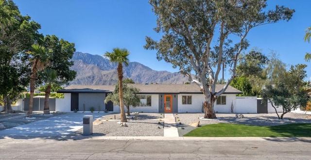 ranch-style house with a mountain view