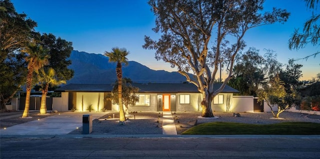 view of front of property with a mountain view