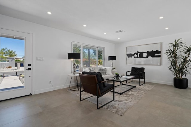 living room featuring a healthy amount of sunlight