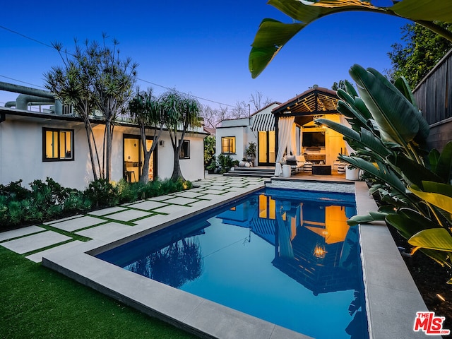 view of swimming pool featuring a patio area