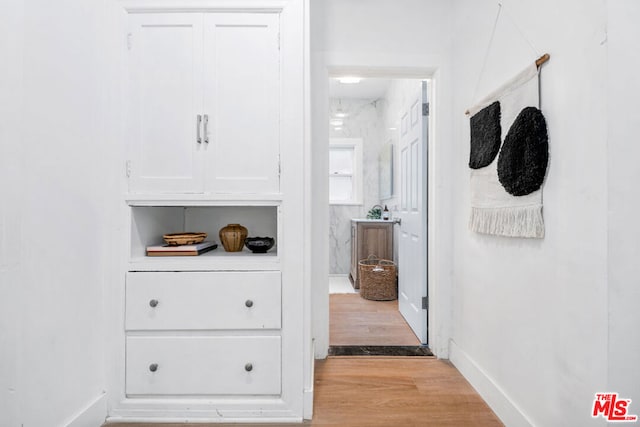 hallway featuring light wood-type flooring