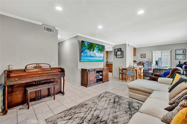 living room featuring light tile patterned floors and ornamental molding