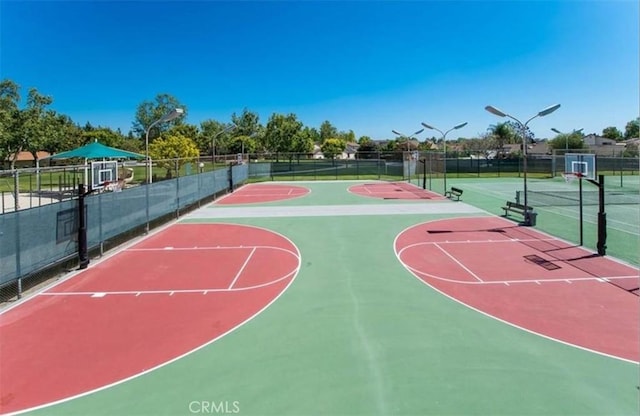 view of sport court with tennis court