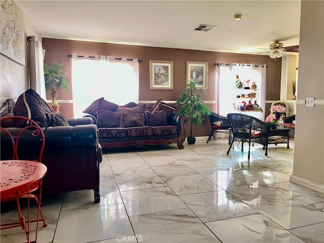 living room featuring ceiling fan