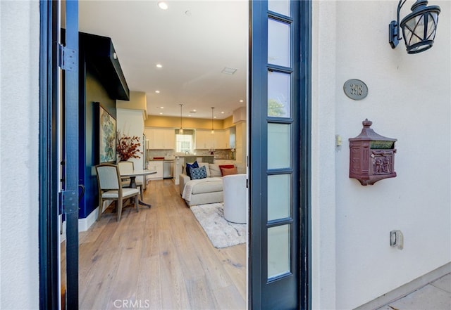 interior space with light hardwood / wood-style floors