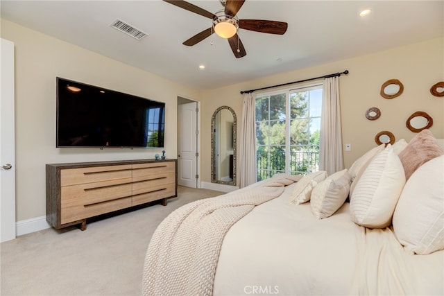 bedroom with access to exterior, light colored carpet, and ceiling fan