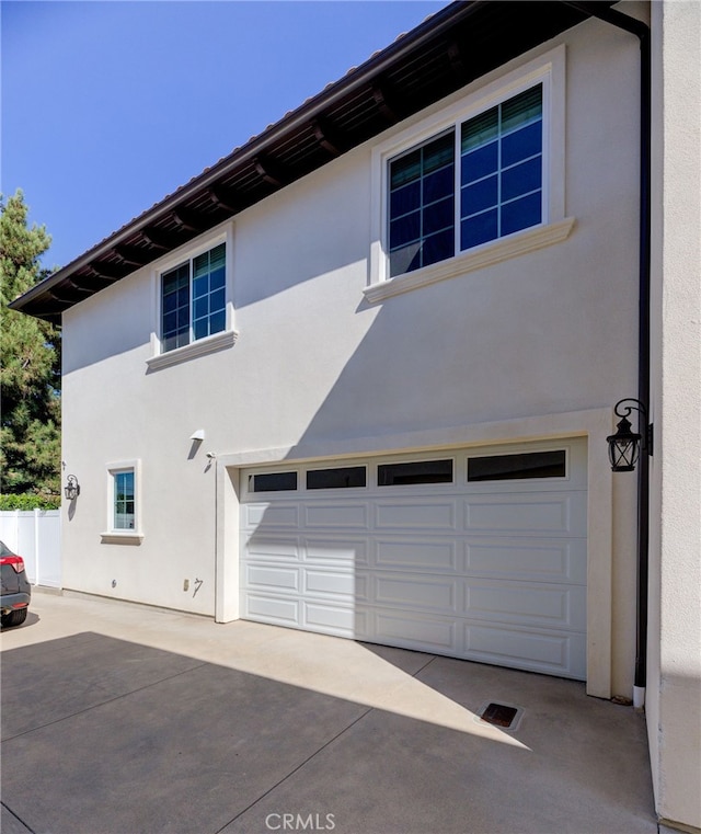 exterior space featuring a garage