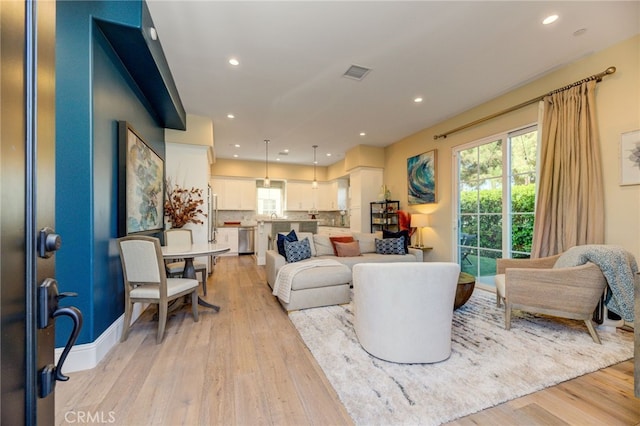 living room featuring light hardwood / wood-style flooring