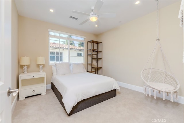 carpeted bedroom with ceiling fan