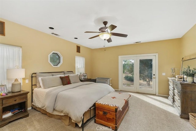 carpeted bedroom featuring ceiling fan and access to exterior