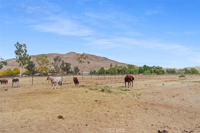 view of mountain feature with a rural view