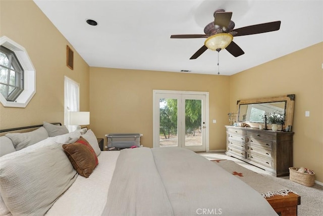 carpeted bedroom with access to outside and ceiling fan