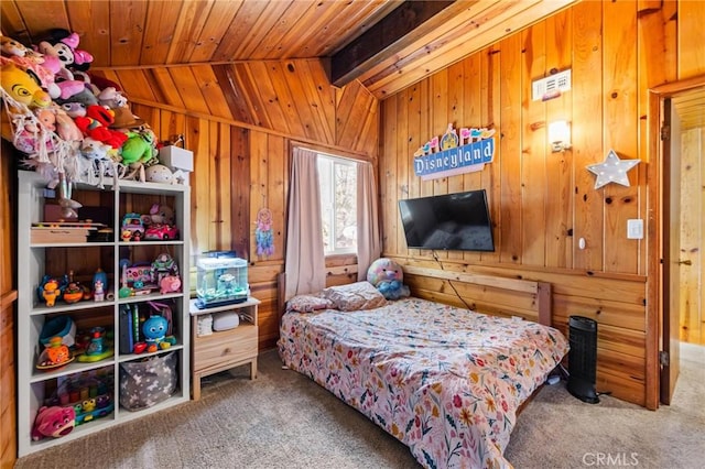 carpeted bedroom featuring lofted ceiling, wood ceiling, and wooden walls