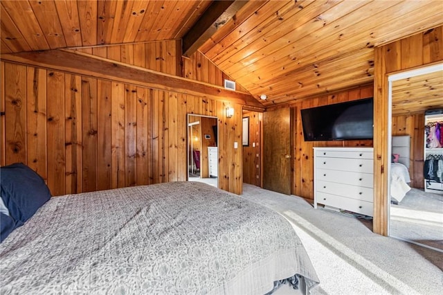 carpeted bedroom featuring wood ceiling, vaulted ceiling, and wood walls