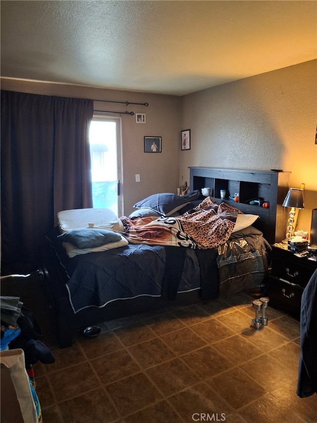 bedroom featuring a textured ceiling