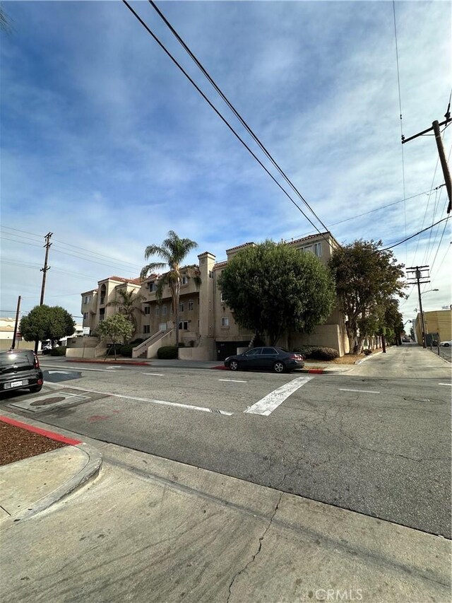 6100 Rugby Ave Unit 207, Huntington Park, CA 90255 - view of asphalt street featuring curbs and sidewalks