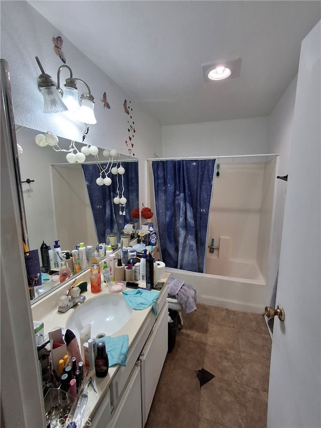 6100 Rugby Ave Unit 207, Huntington Park, CA 90255 - bathroom with vanity, shower / bath combo with shower curtain, and tile patterned floors