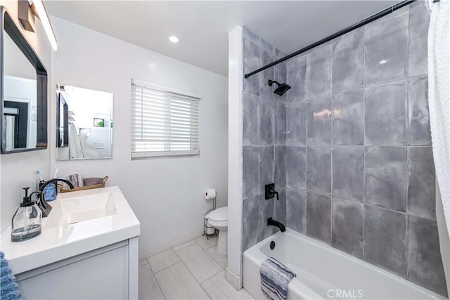 full bathroom featuring shower / tub combo, vanity, and toilet